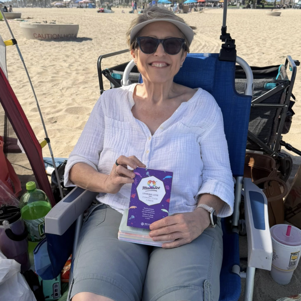 mary with cards on beach